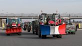 French farmers blockade Paris in heated protest