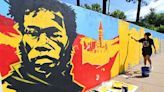 PHOTOS: Fayetteville mural begins taking shape | Northwest Arkansas Democrat-Gazette