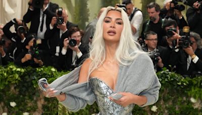 Kim Kardashian Reveals the Reason for a Sweater Over Her Waist-Cinching Met Gala Gown