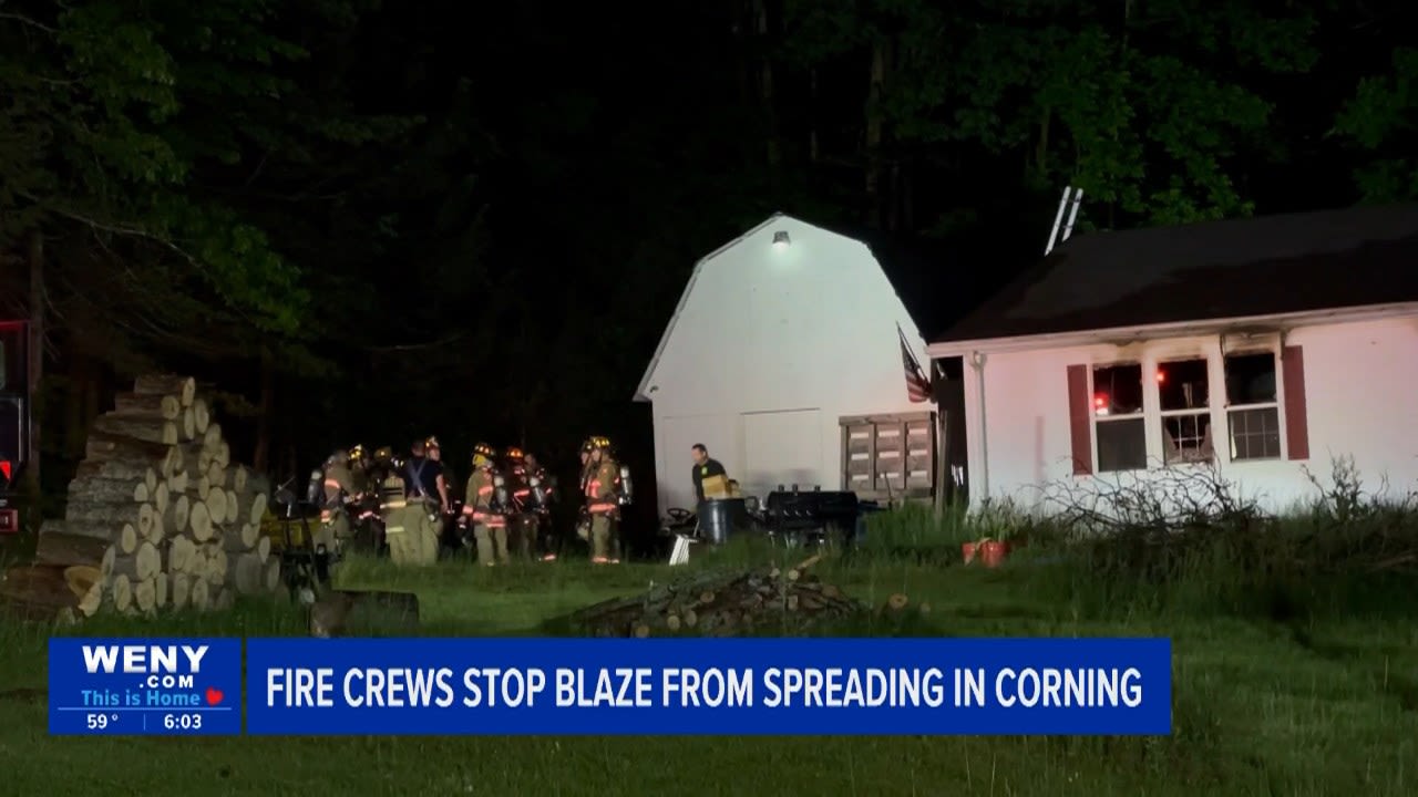 Fire crews stop blaze from spreading in a home in Corning