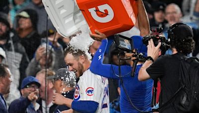 Bellinger HRs in return, Imanaga pitches into the 8th, and Busch walks it off in the rain at Wrigley in Cubs’ thrilling win