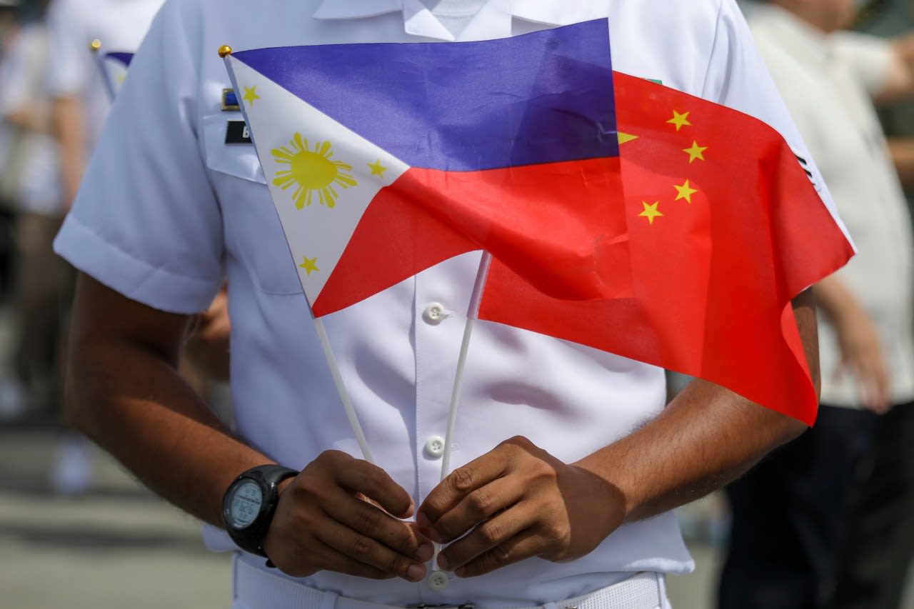 China and the Philippines reach deal in effort to stop clashes at fiercely disputed shoal