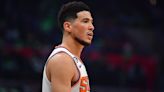 Injured Devin Booker put up shots at Phoenix Suns' morning shootaround on Friday