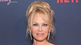 Pamela Anderson Channels Baywatch With Fiery Red Look at Documentary Premiere