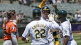 Rooker, Schuemann hit 3-run homers in Athletics’ 19-8 rout of Orioles