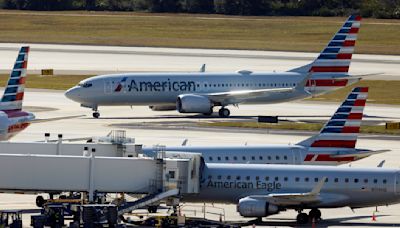 Blown landing-gear tire causes a flight delay at Tampa International Airport; no injuries reported