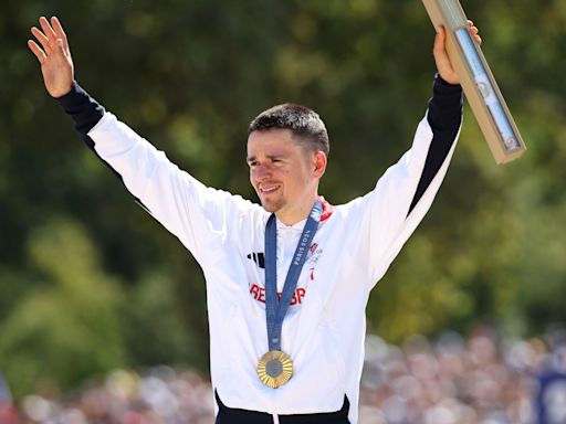 What are the gifts Olympians are receiving in Paris alongside their medals?