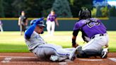 KC Royals involved in another controversial review vs. Rockies. This was the result