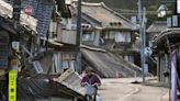 Photos show flattened buildings, crumbled roads after powerful earthquakes rock Japan