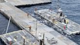 US military says Gaza Strip pier project is completed, aid to soon flow as Israel-Hamas war rages on