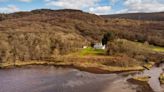 Inside secluded Scots loch-side cottage for sale in 'charming fishing village'