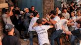 Thousands of Israelis march through Jerusalem, some attacking Palestinians