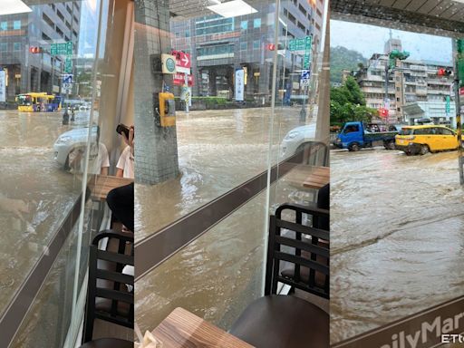 雨彈猛攻信義區「整條大淹水」 水淹到小腿！民眾困店內