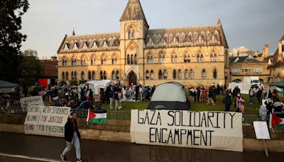 With bright tents and sombre mood, protesting UK students show solidarity with US peers