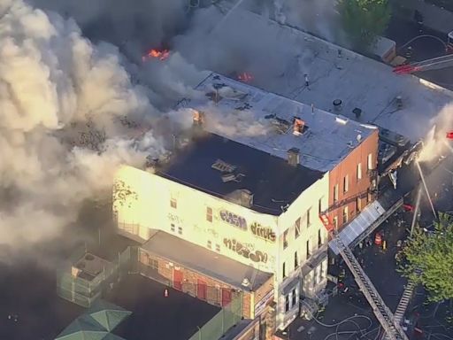 FDNY battle 5-alarm supermarket fire that spread to multiple buildings in Brooklyn