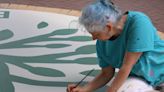Artist finishes third mural in downtown Elon plaza