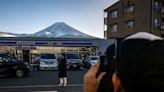 Overrun Japanese town putting up eight-foot barrier to block tourist photos of Mount Fuji