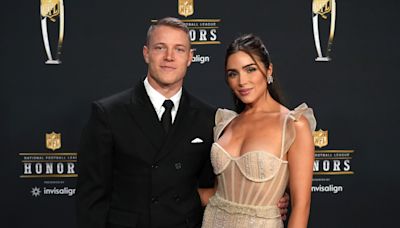 People hate Olivia Culpo's wedding dress, and Christian McCaffrey is clapping back