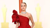 Cara Delevingne Makes Her Oscars Red Carpet Debut in a Daring Gown with a Thigh-High Slit