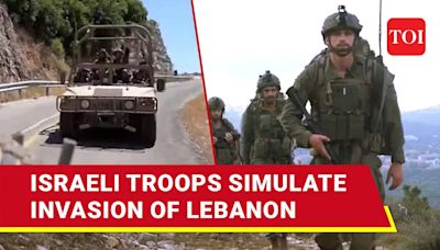 Hezbollah Launches Explosives-Laden Drones Toward Northern Israel; IDF Simulates Lebanese Invasion - Times of India Videos