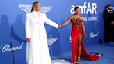 Queen Latifah and Eboni Nichols Hold Hands on Red Carpet at AmfAR Cannes Gala