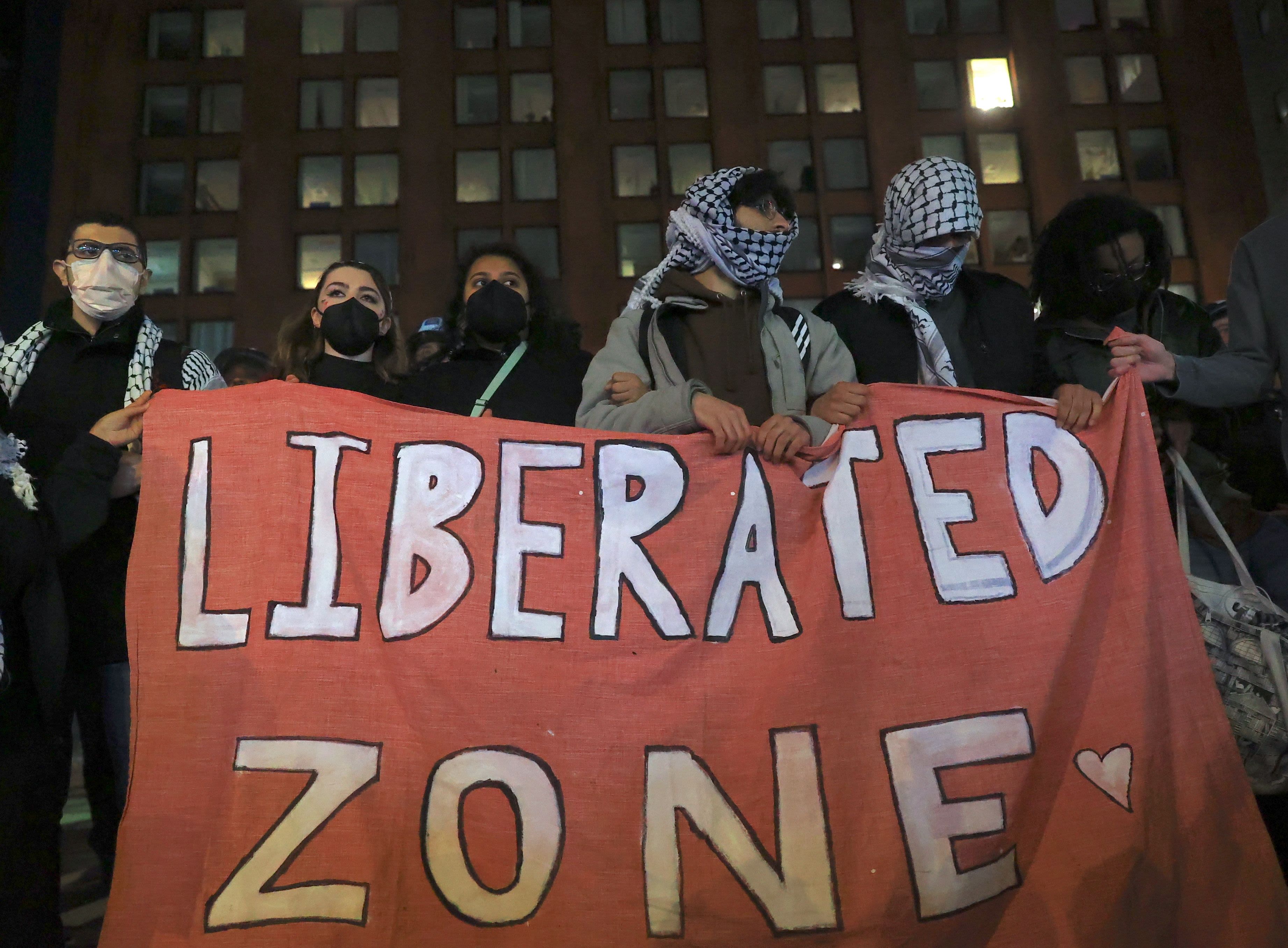 Behind the mask: Why the new US campus protestors cover their faces