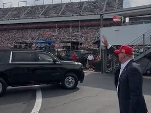 'Stage the moment': Trump accused of being 'caught waving at a non-existent audience'