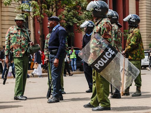 Kenyan police leave for controversial deployment in Haiti to take on powerful, violent gangs