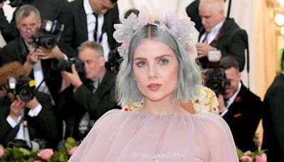 Lucy Boynton Recalls Dyeing Her Hair Blue On A 'Whim' For Debut Met Gala Appearance