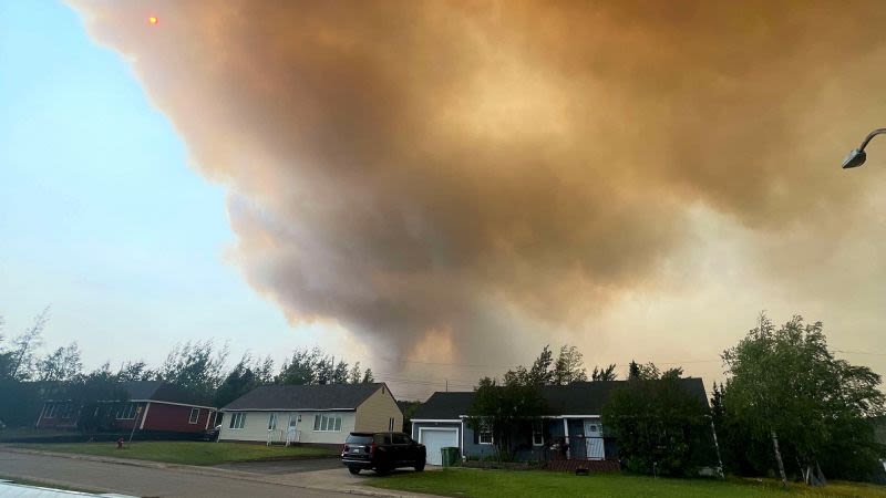 Thousands evacuated as ‘extremely aggressive’ wildfire burns in eastern Canada | CNN