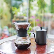 Uses a paper or metal filter to brew coffee Water is poured over coffee grounds in a filter Brews one cup of coffee at a time Requires a bit of skill and practice to use