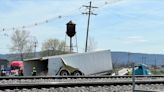 Train hits tractor trailer near manufacturing plant in Waverly