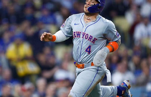 Francisco Alvarez of the New York Mets scores a run against the Los Angeles Dodgers in the second inning at Dodger Stadium on April 19, 2024, in Los Angeles.