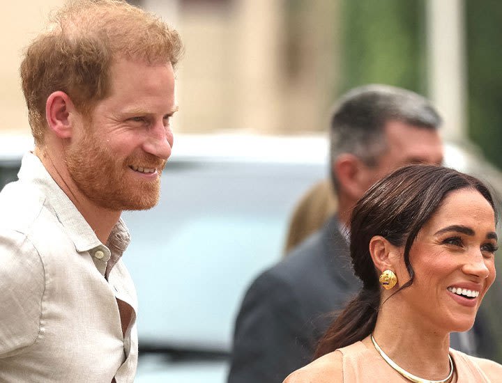 Brand-New Pics of Prince Harry and Meghan Markle in Nigeria Give Huge Insight into Their Marriage