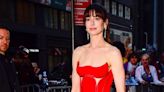 Anne Hathaway Wore a transparent Bustier Top and a Red-Hot Cutout Versace Dress in the Same Day