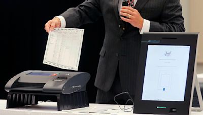 Voting machine execs indicted in alleged Philippines bribery scheme