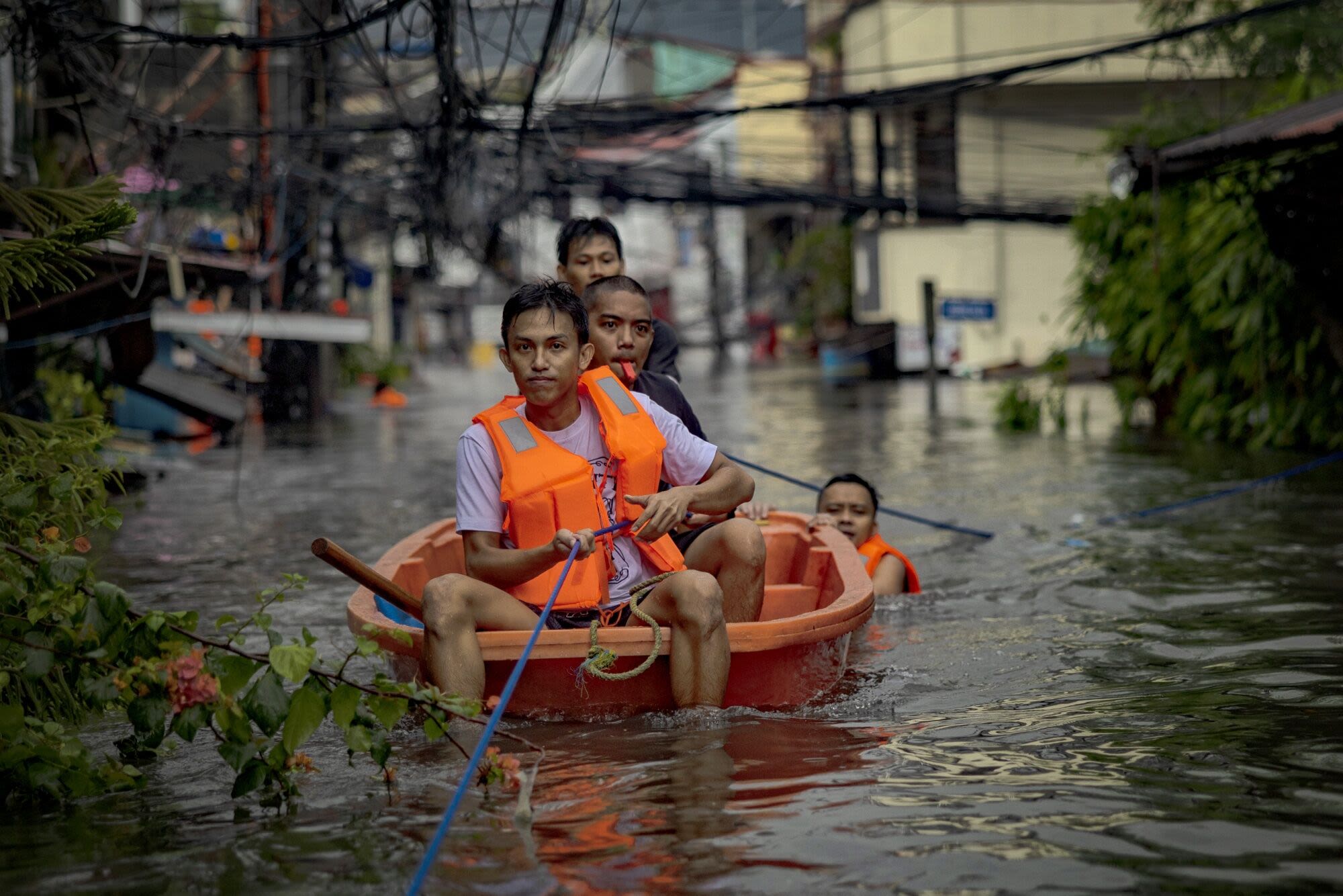 Deadly Storm Floods Northern Philippines, Shuts Down Taiwan