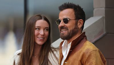 Justin Theroux, 53, and new fiancée Nicole Brydon Bloom, 30, cuddle up