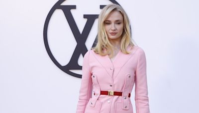 Sophie Turner Pops in a Bubblegum-Pink Pantsuit at Louis Vuitton’s Cruise Show