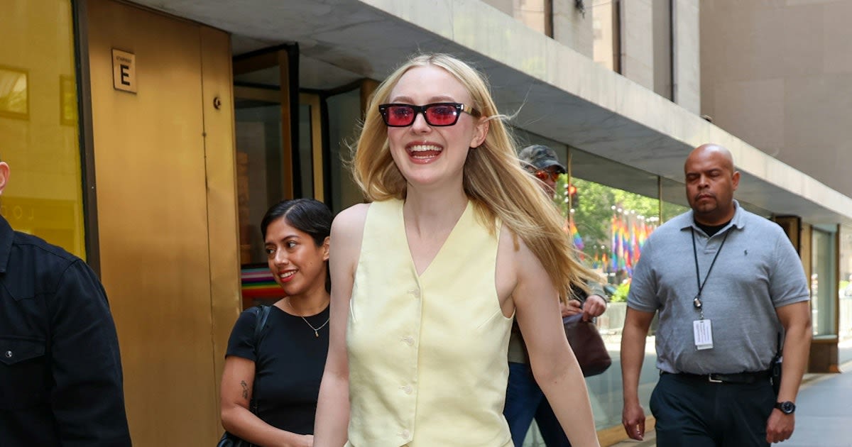 Dakota Fanning Pairs a Buttery Suit Set With a Coded Luxury Status Symbol