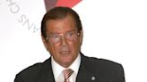 Sir Roger Moore gravesite 'vandalised with family shield stolen from tombstone'