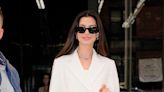 Anne Hathaway Shows Off Her Toned Legs As She Rocks A Winter White Mini Dress