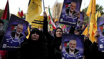 Iran’s supreme leader prays over the coffin of Hamas leader Haniyeh, whose killing risks a wider war - News