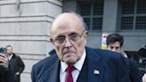 Giuliani says he will stop accusing Georgia workers of election tampering