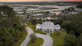 If you think the water views at this $2M SC island home are amazing, check out the inside wood work