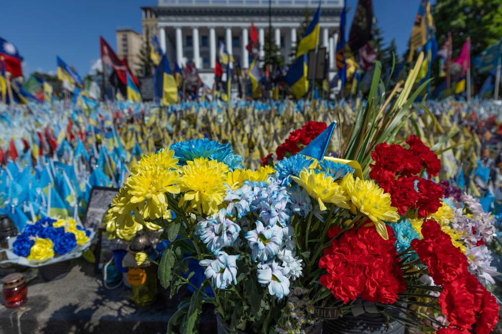 A precious moment in time of war: Flowers for a wife and daughter coming home to Ukraine