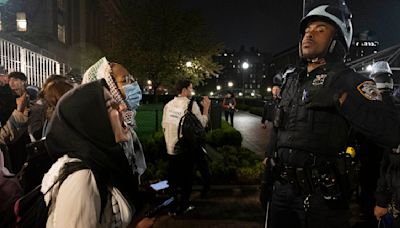 Biden keeps quiet as Gaza protesters and police clash on college campuses