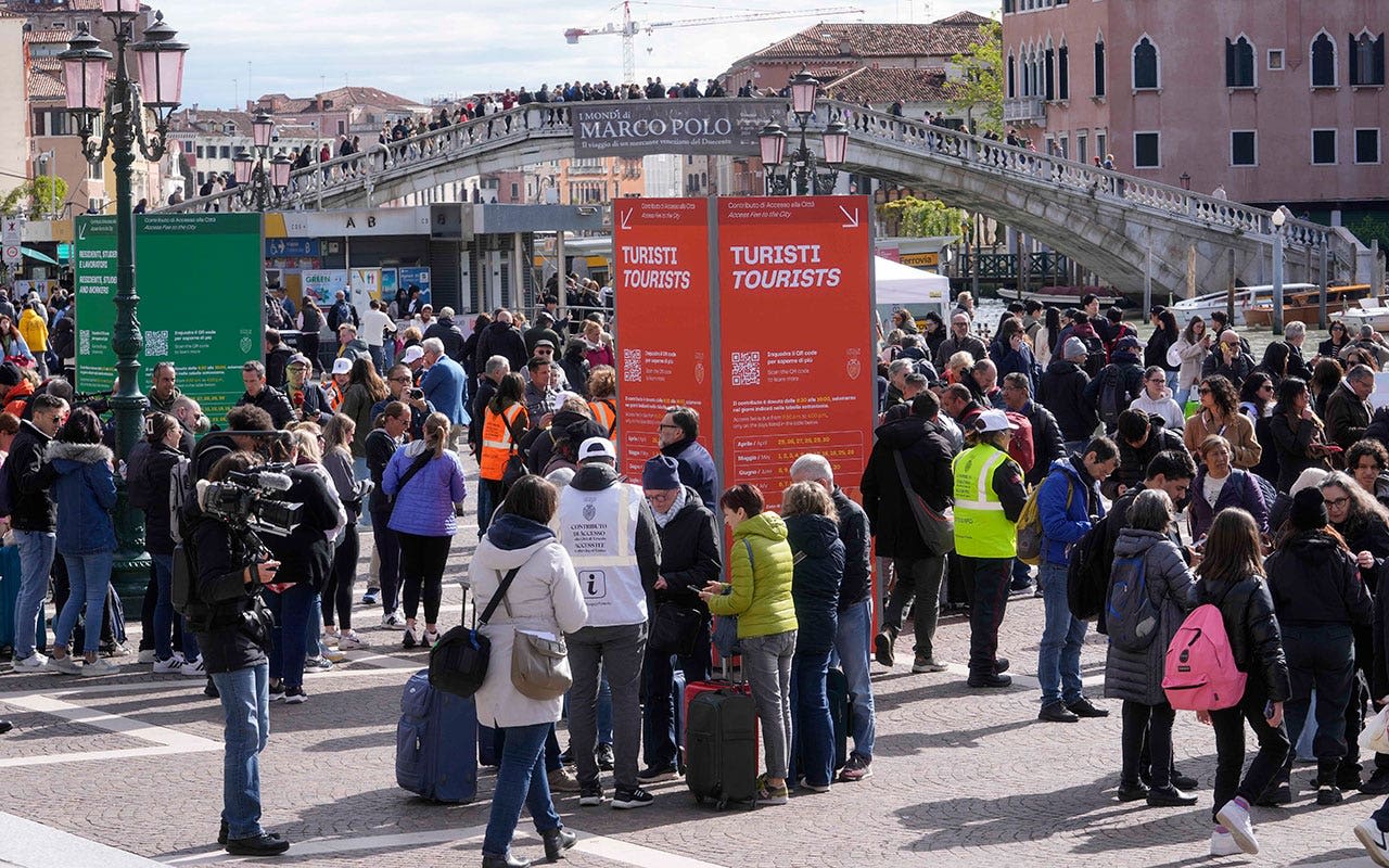 Venice begins charging entry fee for day-trippers to address tourism crisis