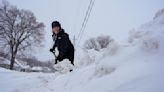 Snow, ice, wind and bitter cold pummels the northern US in dangerous winter storm