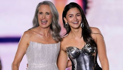 Alia Bhatt makes stunning debut at Paris Fashion Week, walks hand-in-hand with Andie MacDowell at star-studded show. See here: